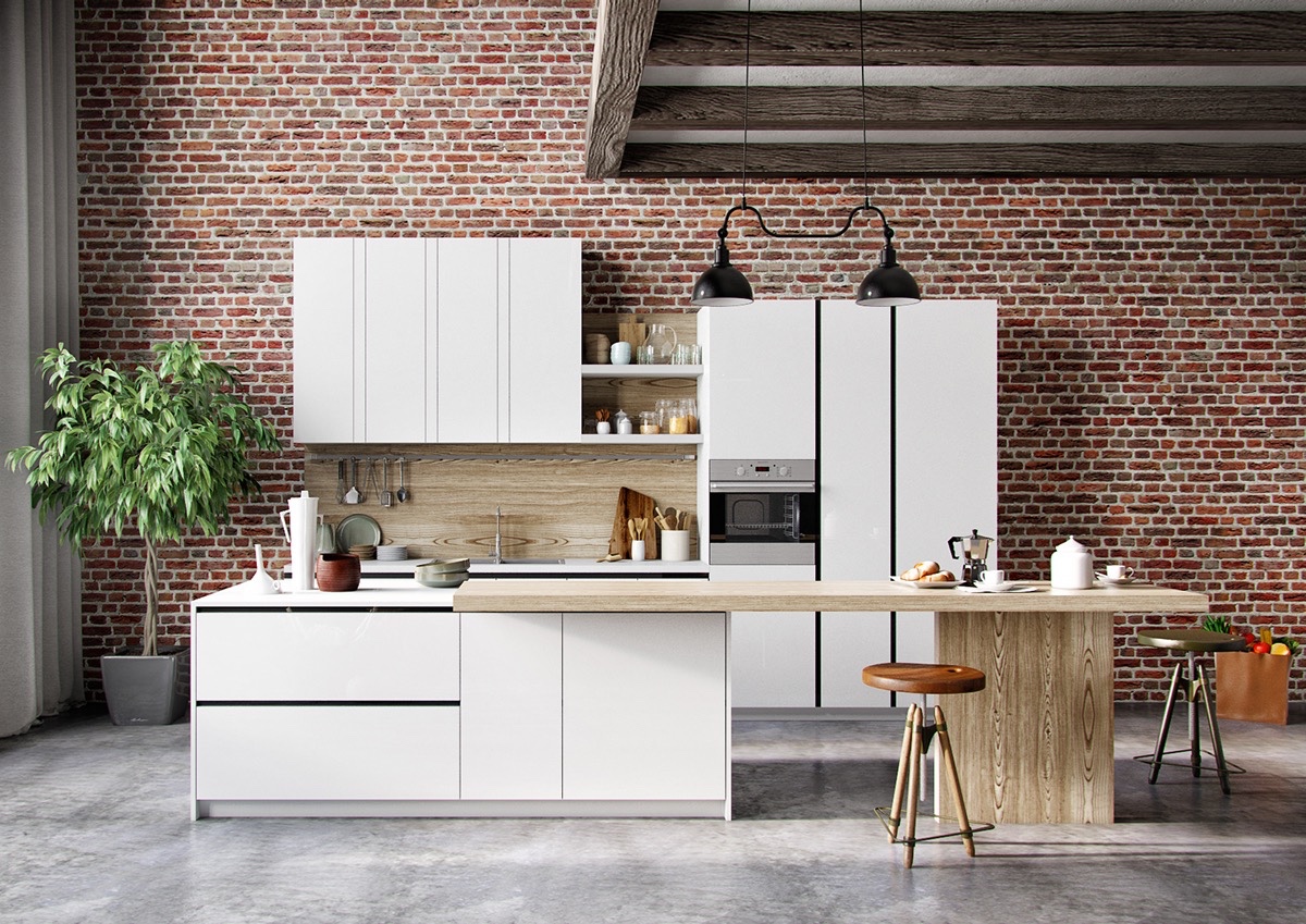 Mobili da cucina moderni bianchi e muro di mattoni
