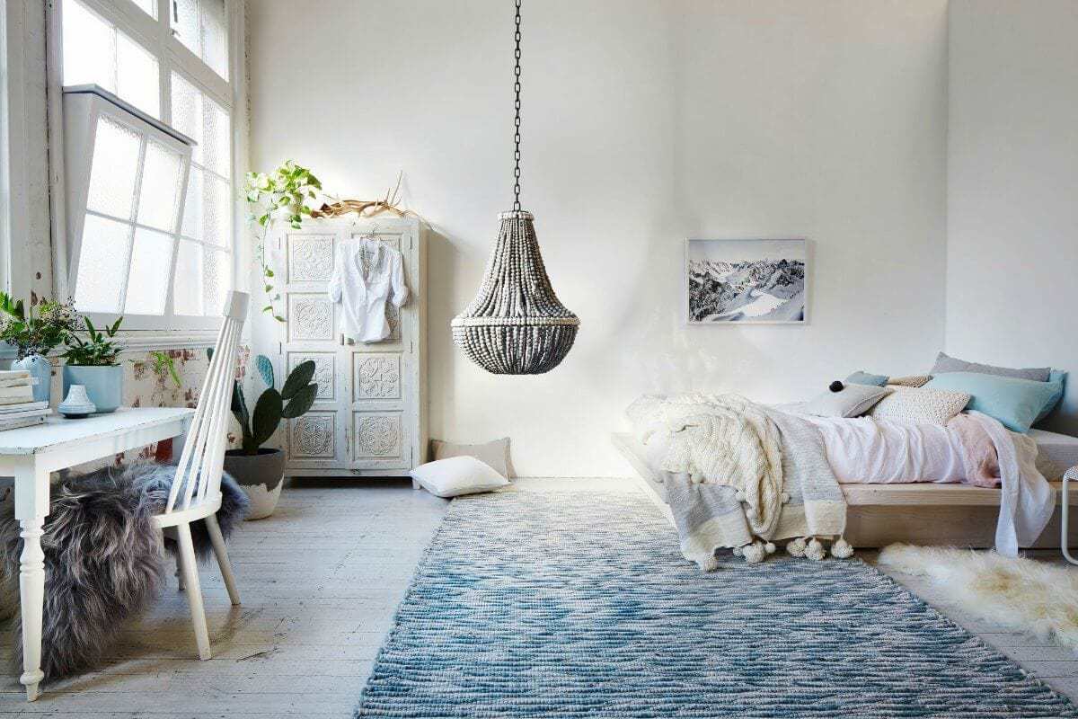 Camera da letto Boho blu e bianca