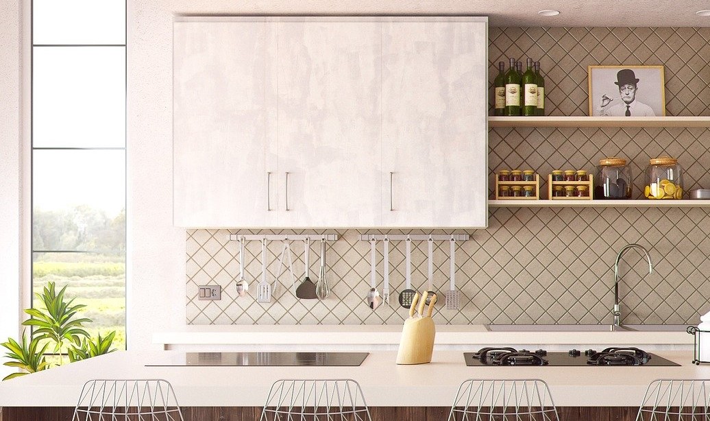 White kitchen with a unique pattern on wall