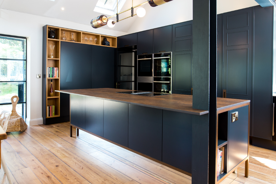 Simple black kitchen with wood