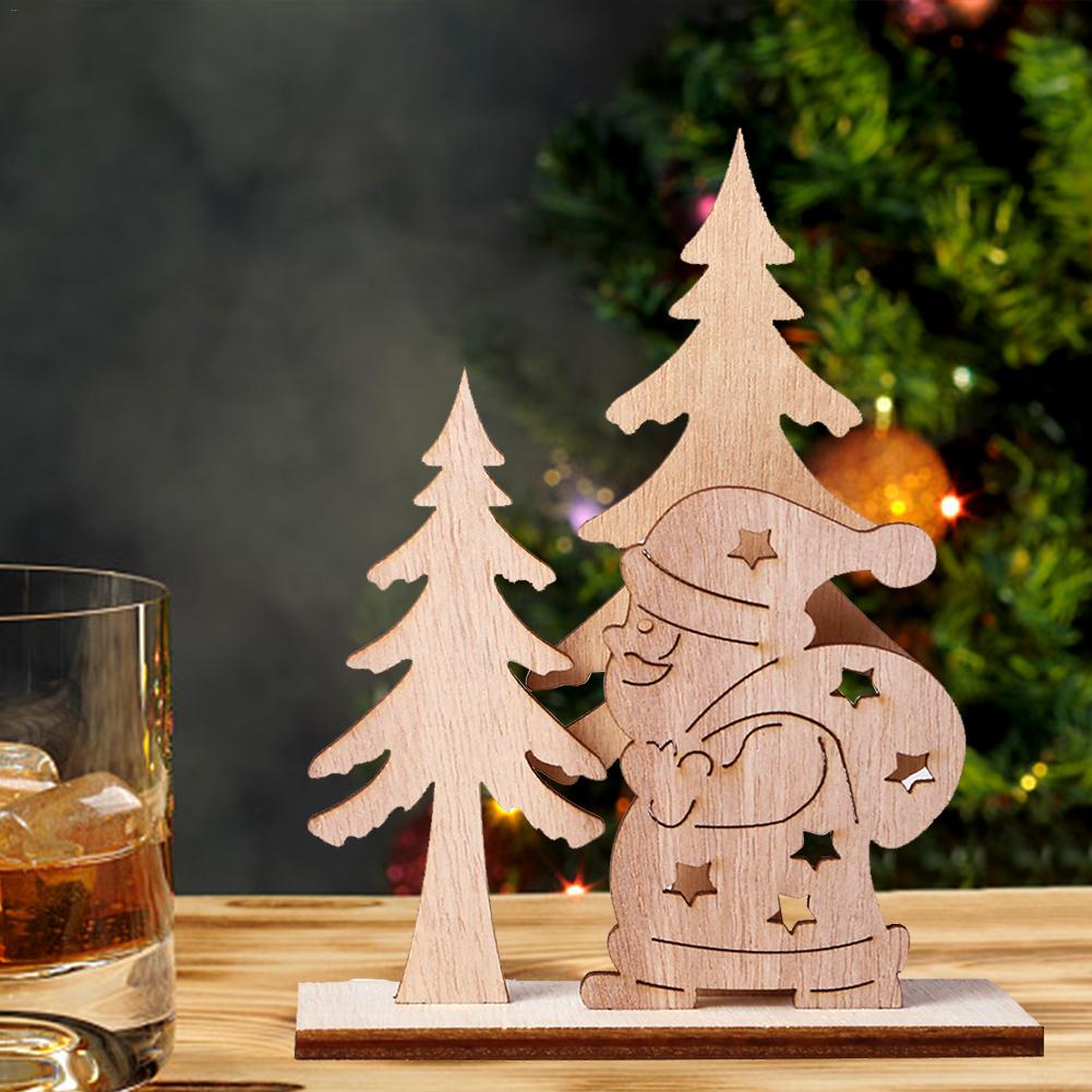 Una decoración de madera: el árbol de Navidad y Papá Noel