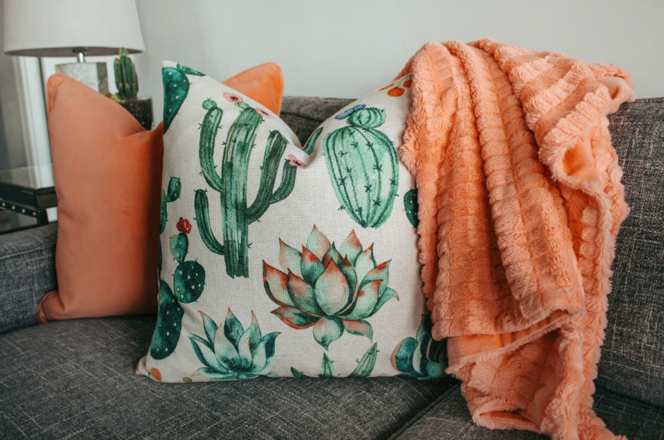 Living room spring home decor - spring themed blankets and cushions