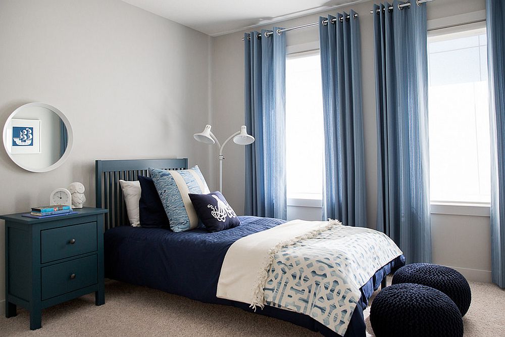 A grey and navy blue bedroom - an idea for a peaceful interior