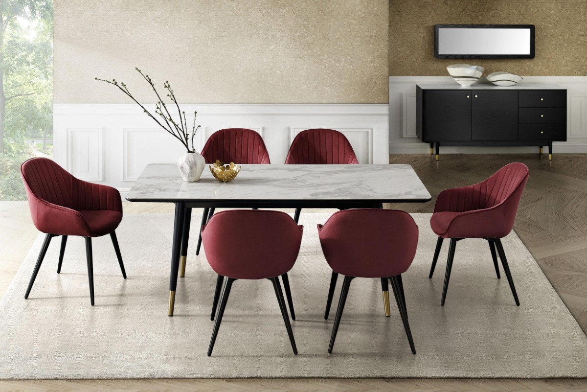 A dining room with the color maroon
