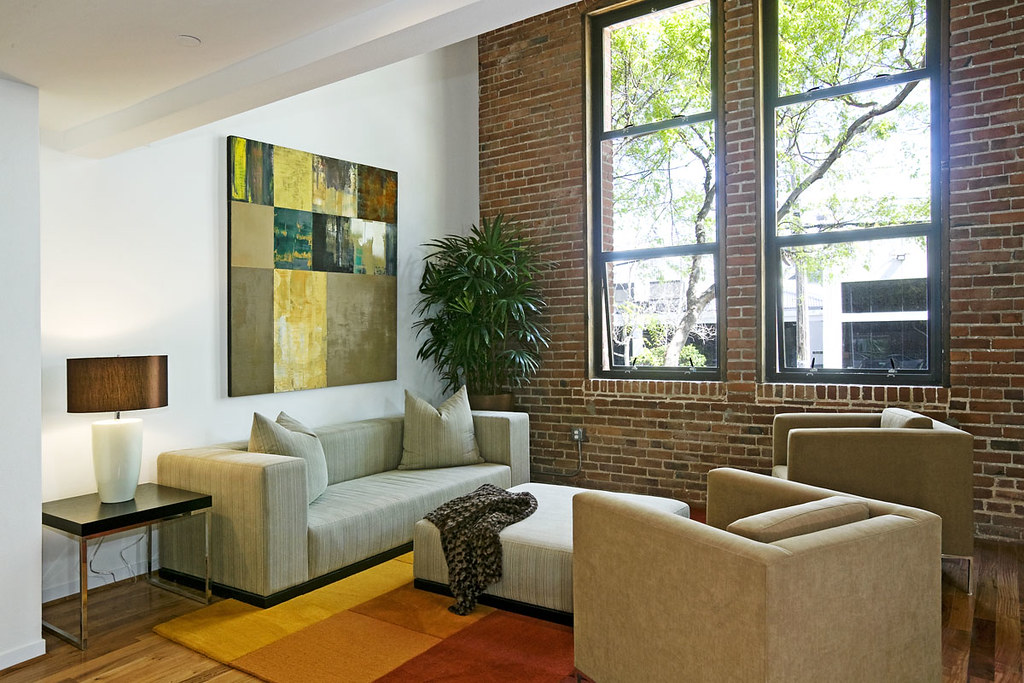 A classic interior with exposed brick wall