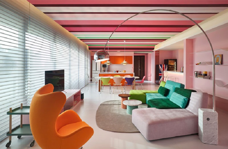 An open concept kitchen - an interior - a colorful interior