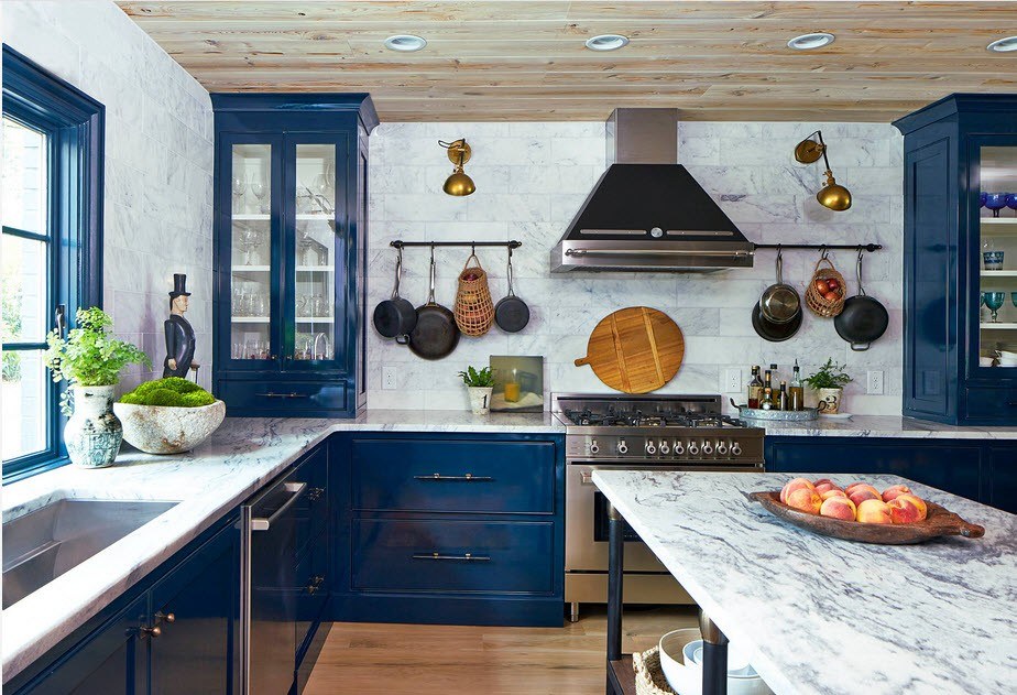 Navy blue kitchen cabinets with wood