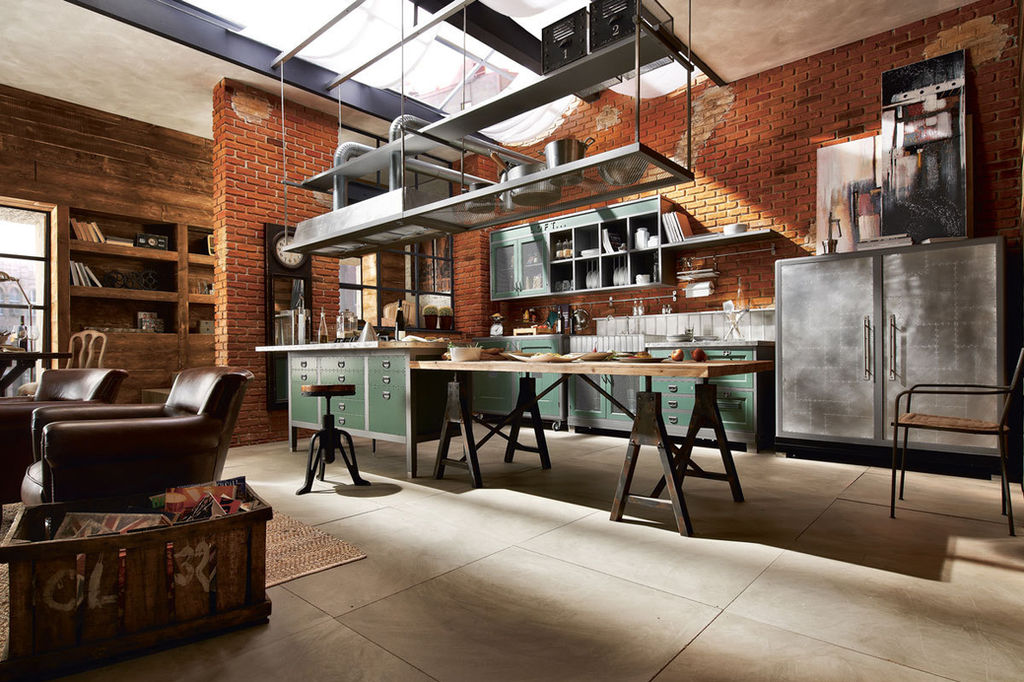 A dark open-plan kitchen - industrial style