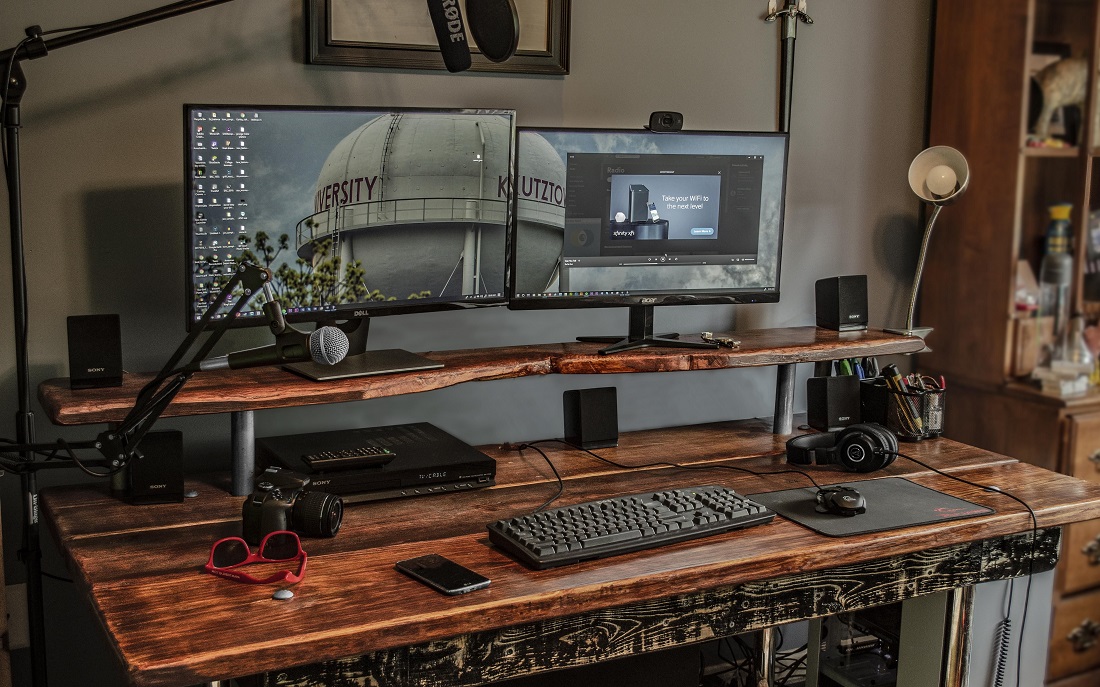 Industrial style gaming room setup - wood