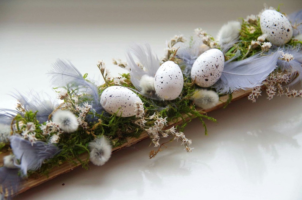 An Easter centerpiece on a piece of wood