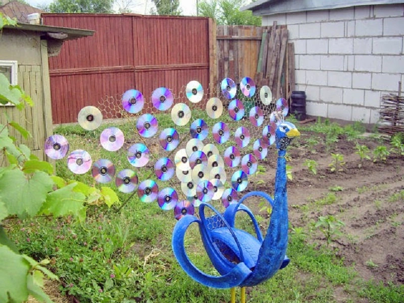 Garden tire decor - a peacock