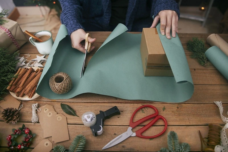 Wrapping gifts with paper