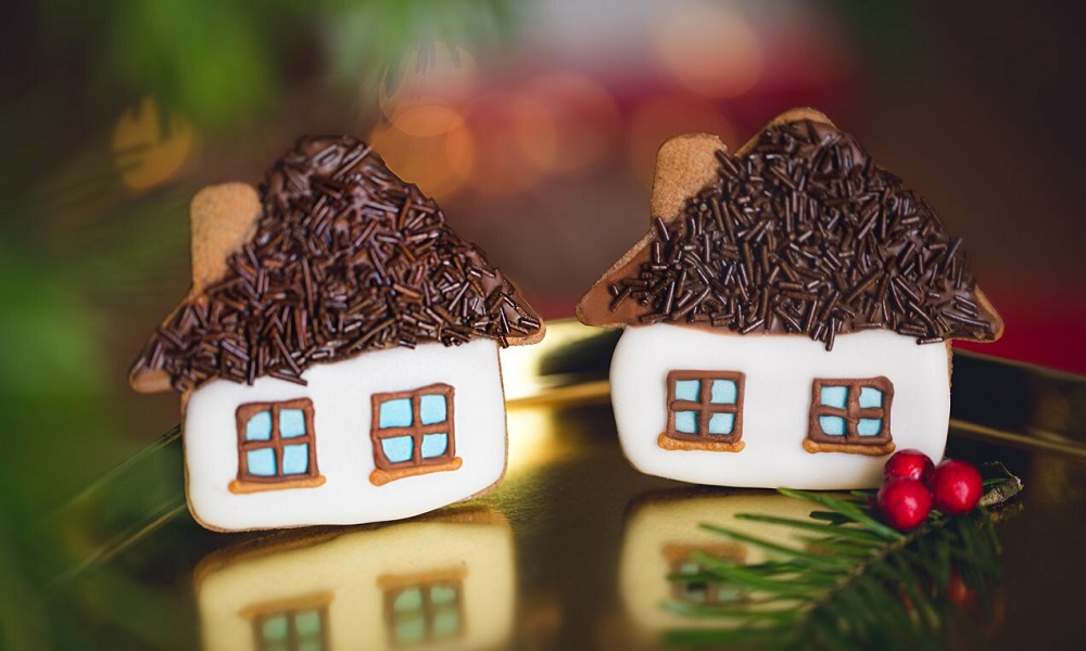 Case di Natale - decorazione creativa dei biscotti di pan di zenzero
