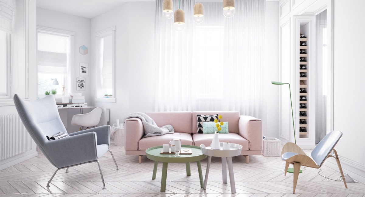 Ein pastellfarbenes Sofa in einem skandinavischen Wohnzimmer