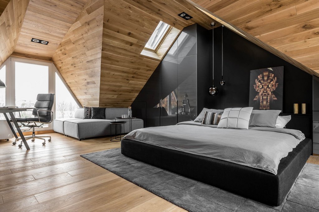 Una moderna camera da letto in mansarda - interessanti idee d'interni
