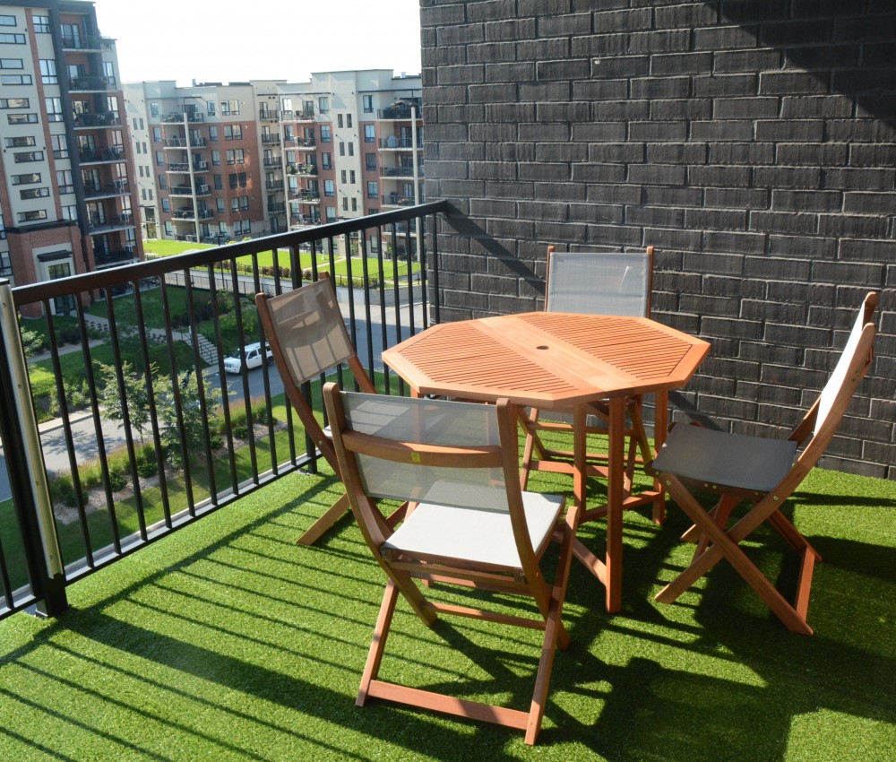 Synthetic fake grass on a balcony