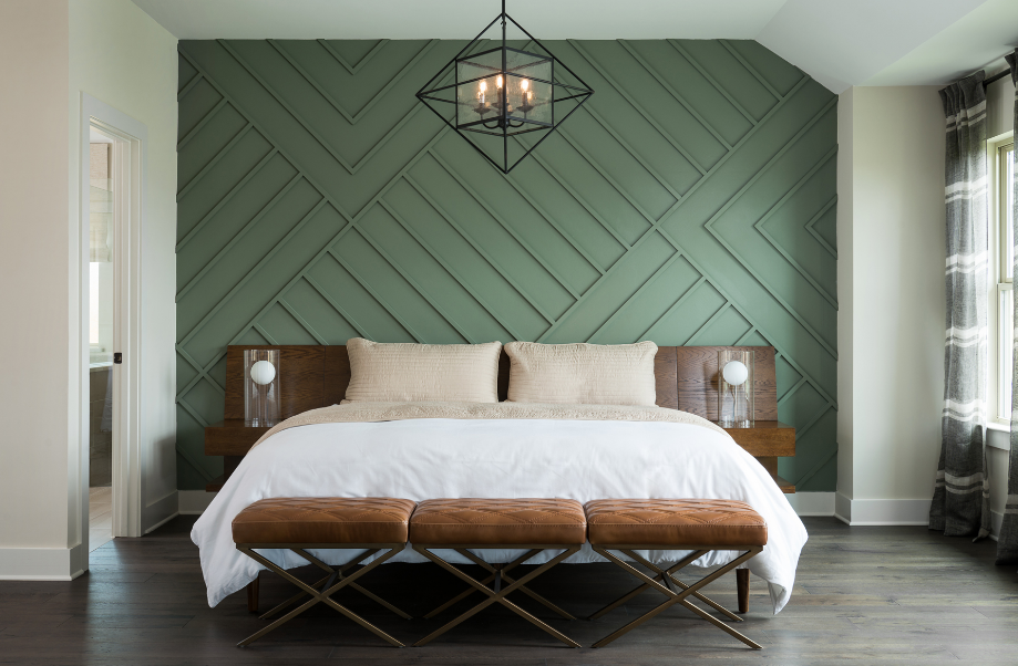 Идеи зеленой спальни - интересный рисунок на стене